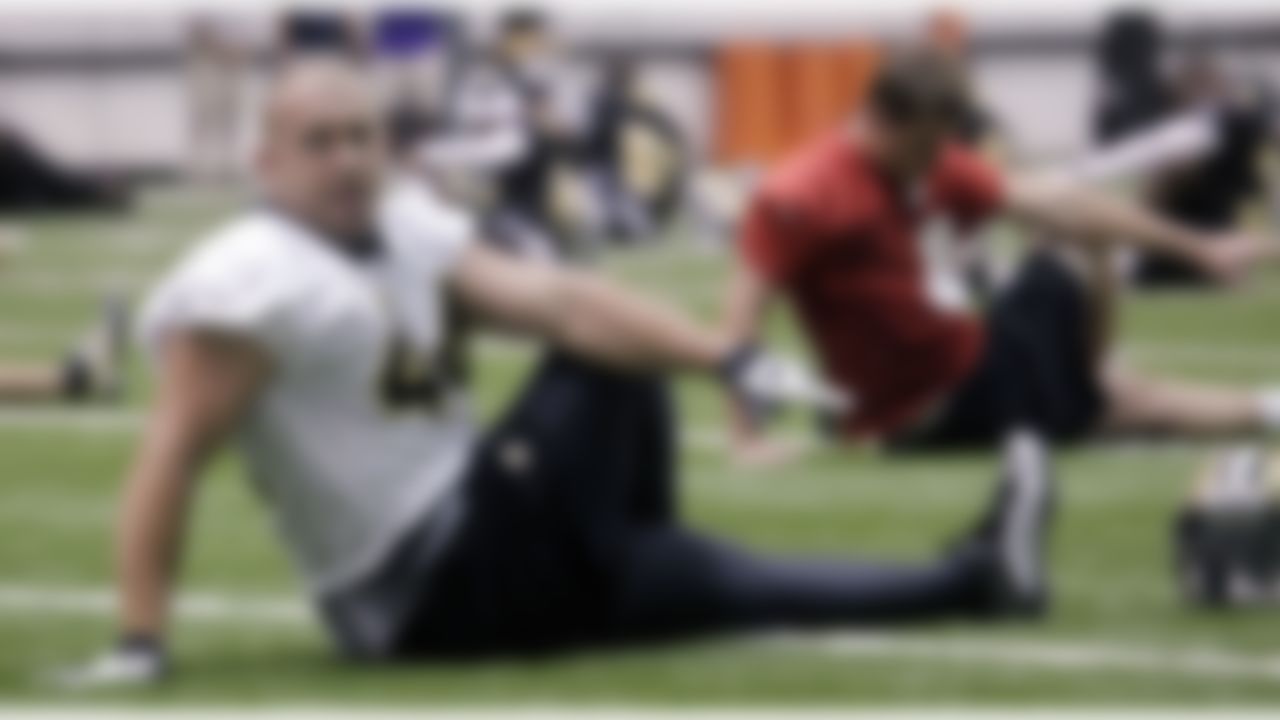 New Orleans Saints running back Heath Evans (44) stretches during football practice at the team's NFL training facility in Metairie, Thursday, May 27, 2010.(AP Photo/Bill Haber)