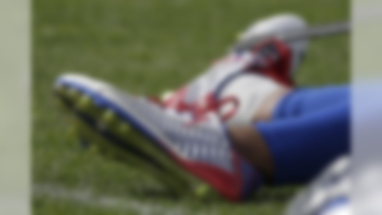 New York Giants wide receiver Odell Beckham Jr., stretches out with his cleats on during the team's NFL football training camp, Thursday, Aug. 6, 2015, in East Rutherford, N.J. (AP Photo/Julie Jacobson)