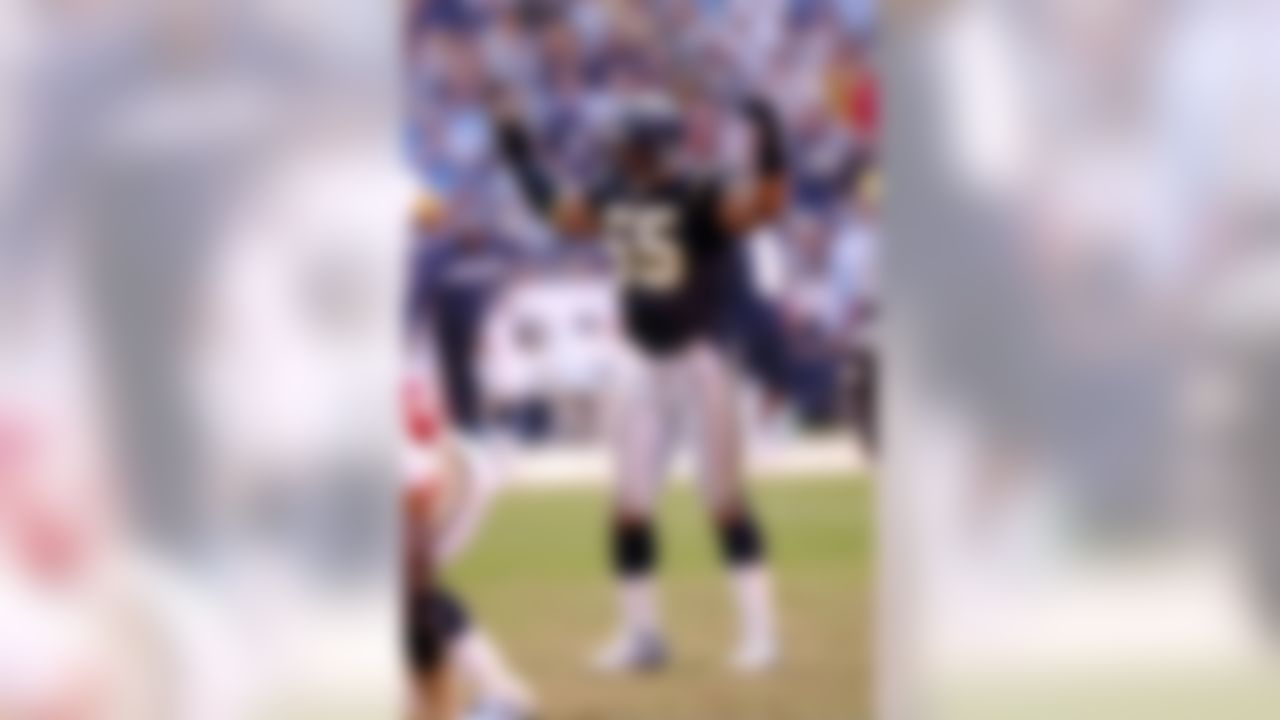 Junior Seau #55 of the San Diego Chargers calls for the crowd to get loud against the Kansas City Chiefs on Nov. 4, 2001 during an NFL football game in San Diego. The Chiefs won 25-20. (AP Photo/G. Newman Lowrance) Junior Seau