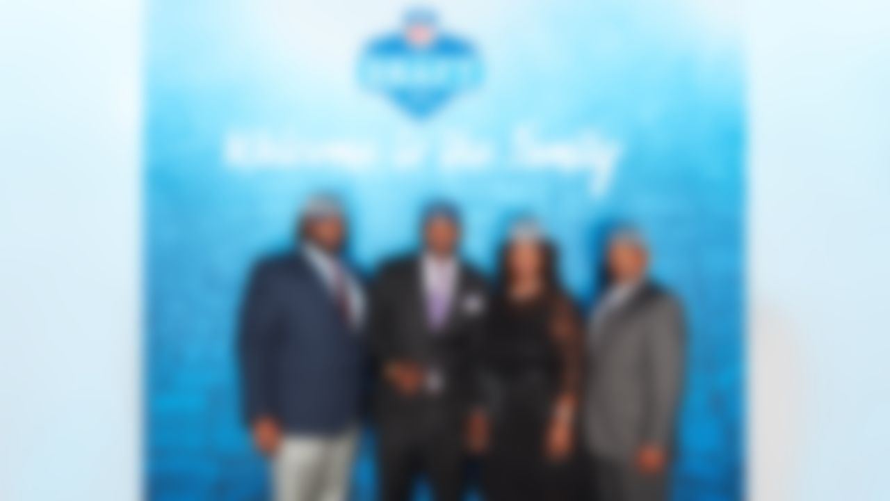 Alabama defensive tackle Jarran Reed poses for a photo with his family after being selected by the Seattle Seahawks during the 2016 NFL Draft at the Auditorium Theatre in Chicago. (Eric Espino/NFL)