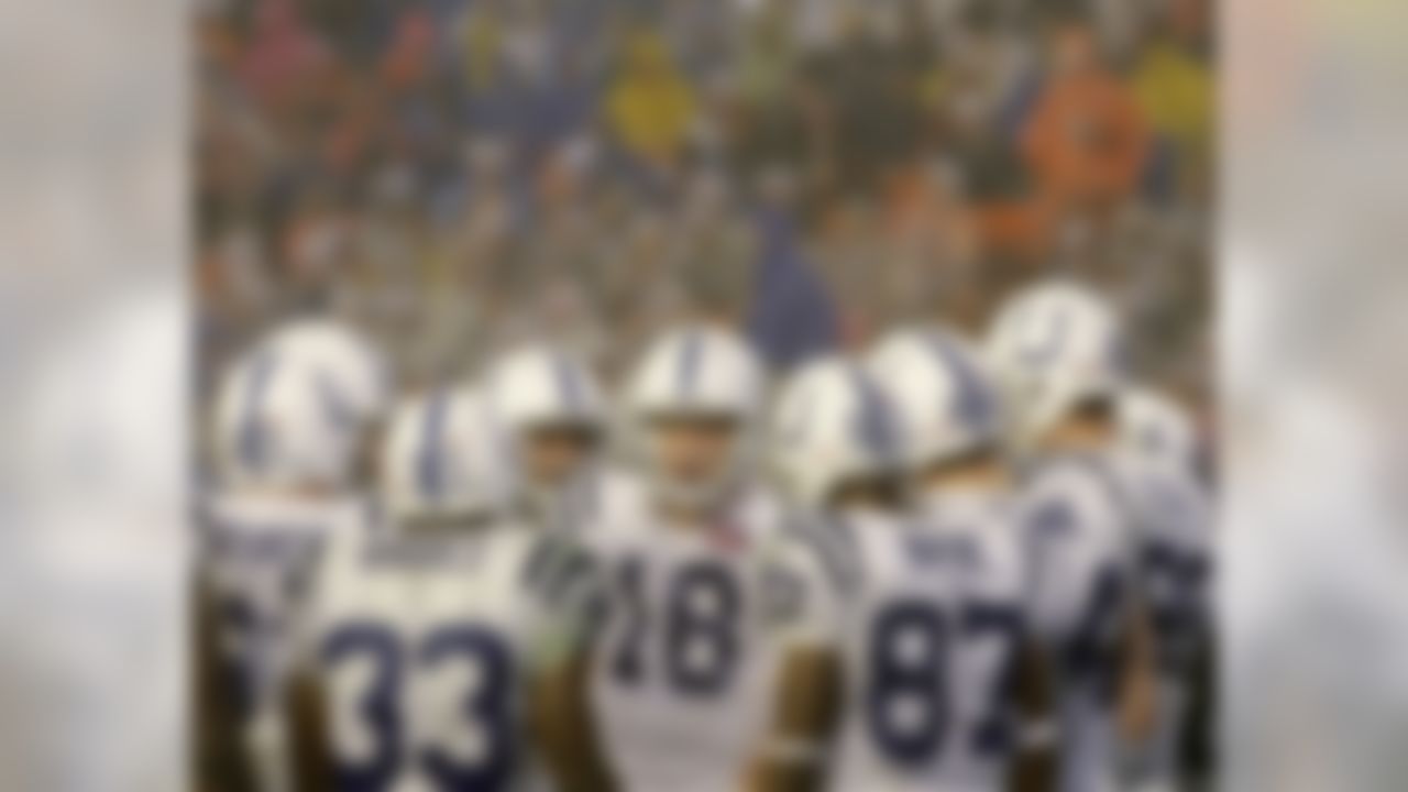 Indianapolis Colts quarterback Peyton Manning (18) directs his team in the huddle in the third quarter of the Super Bowl XLI football game against the Chicago Bears at Dolphin Stadium in Miami on Sunday, Feb. 4, 2007. (AP Photo/Alex Brandon)
