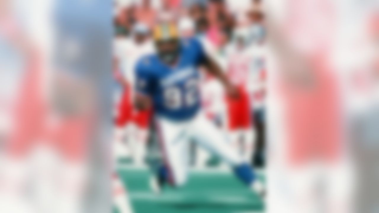 NFC player Reggie White (92) moves towards the play during the Pro Bowl between the AFC and the NFC on February 6, 1994 in Honolulu, Hawaii. The NFC won the game 17-3. (AP Photo/Paul Spinelli)