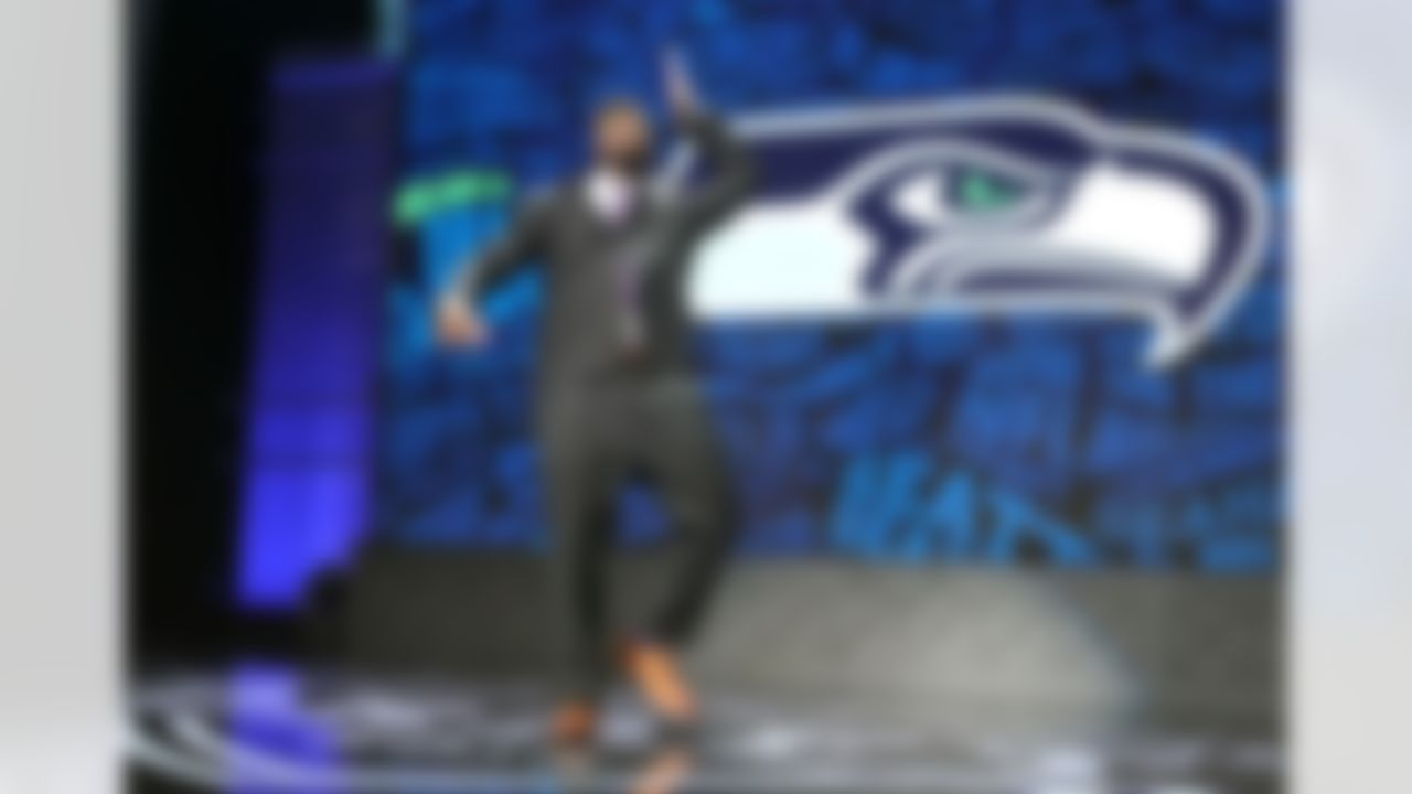Alabama defensive tackle Jarran Reed celebrates onstage after being selected by the Seattle Seahawks during the 2016 NFL Draft at the Auditorium Theatre on Friday, April 29, 2016 in Chicago. (Perry Knotts/NFL)