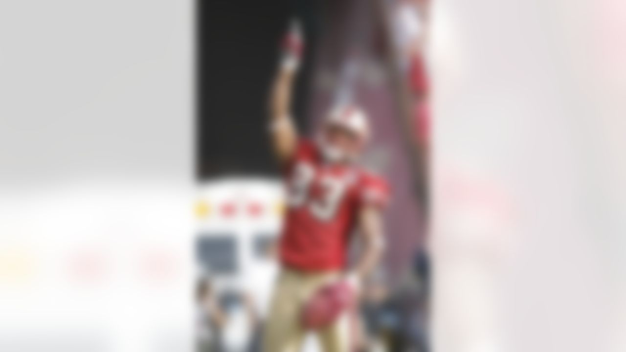 San Francisco 49ers wide receiver Arnaz Battle celebrates his second quarter touchdown. The 49errs led 20 to 0 at half against the Seattle Seahawks at Monster Park in San Francisco, California on November 19, 2006. Photo by Getty Images.