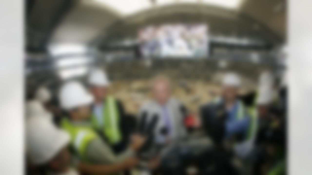 Dallas Cowboys owner Jerry Jones answers questions after a news conference to unveil the world's largest 1080p HDTV video board at Cowboys Stadium, Thursday, May 21, 2009, in Arlington, Texas. The screens, weighing 600 tons, stretch from nearly one 20-yard line to the other. (AP Photo/Matt Slocum)