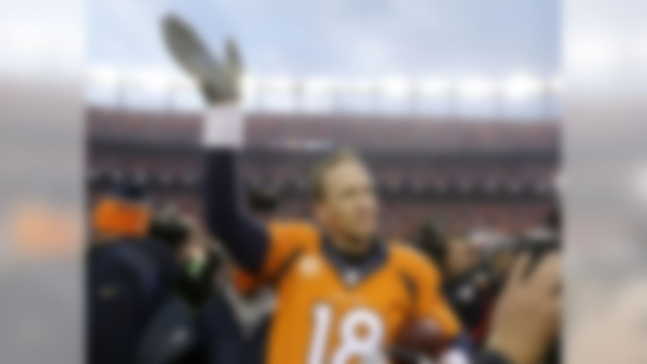 Denver Broncos quarterback Peyton Manning waves to spectators following the AFC Championship game between the Denver Broncos and the New England Patriots, Sunday, Jan. 24, 2016, in Denver. The Broncos defeated the Patriots 20-18 to advance to the Super Bowl. (AP Photo/Chris Carlson)