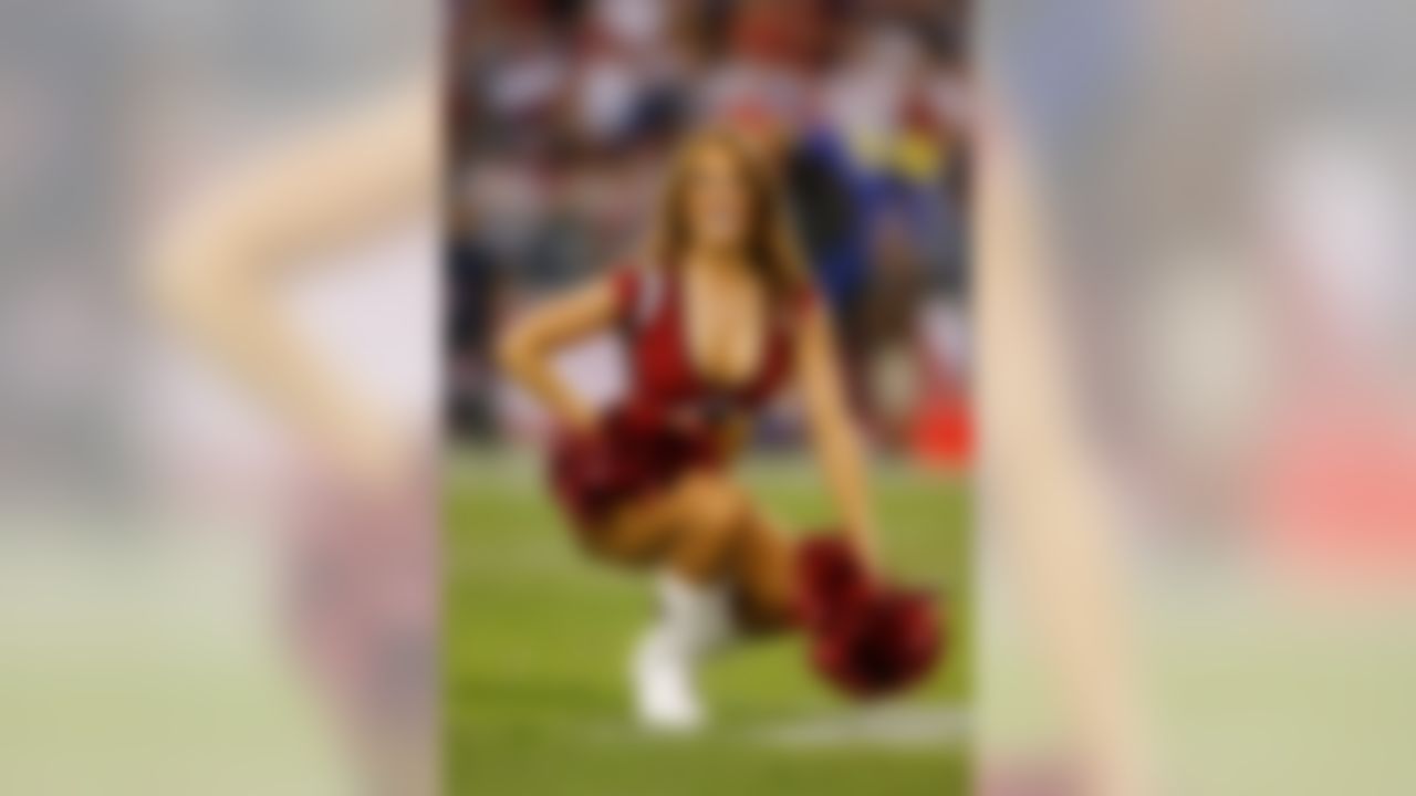 An Arizona Cardinals cheerleader performs during the NFL week 1 game against the San Diego Chargers on Monday, Sept. 8, 2014 at University of Phoenix Stadium in Glendale. (Ric Tapia/NFL)