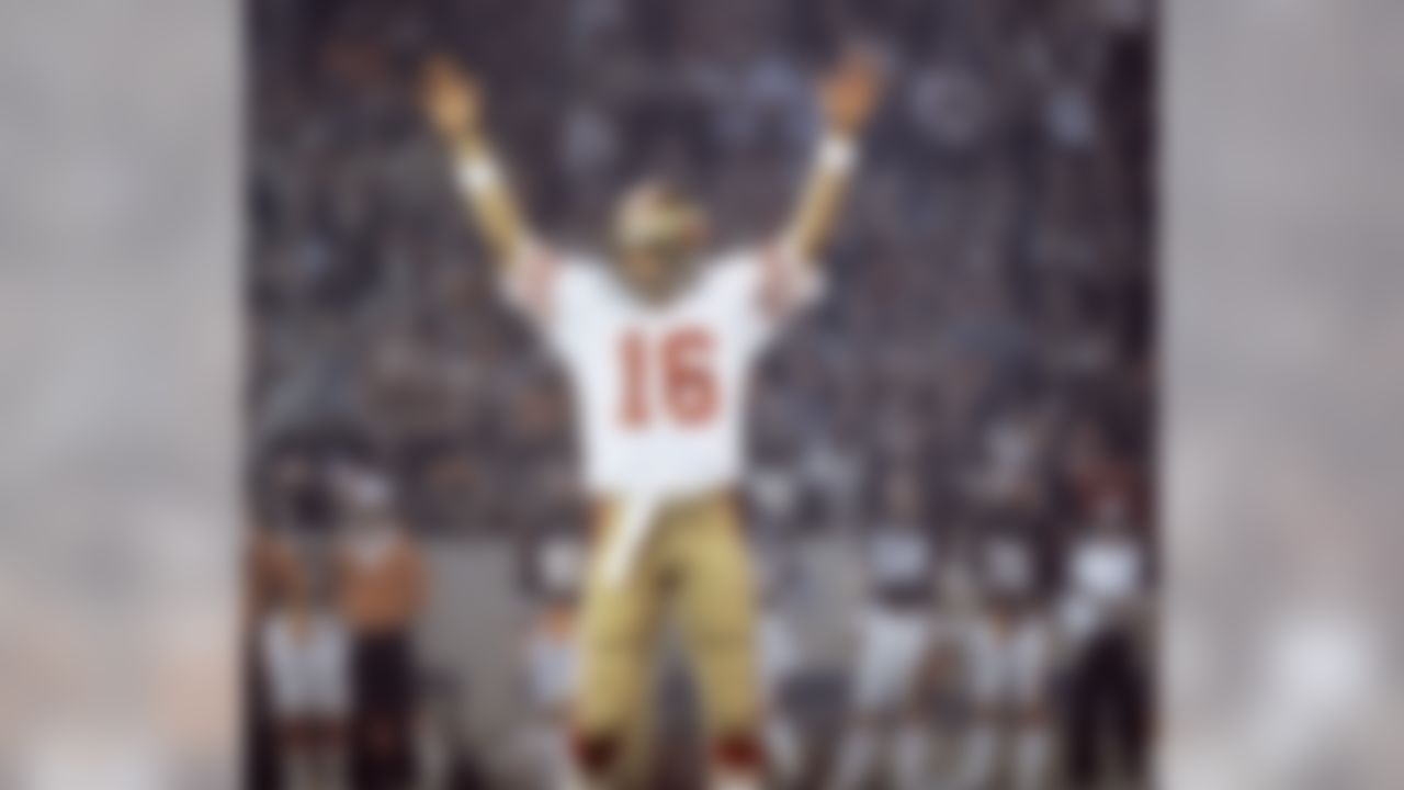San Francisco 49ers Hall of Fame quarterback Joe Montana (16) signals "touchdown" during Super Bowl XVI, a 26-21 victory over the Cincinnati Bengals on January 24, 1982, at the Pontiac Silverdome in Pontiac, Michigan. (AP Photo/Vernon Biever)
