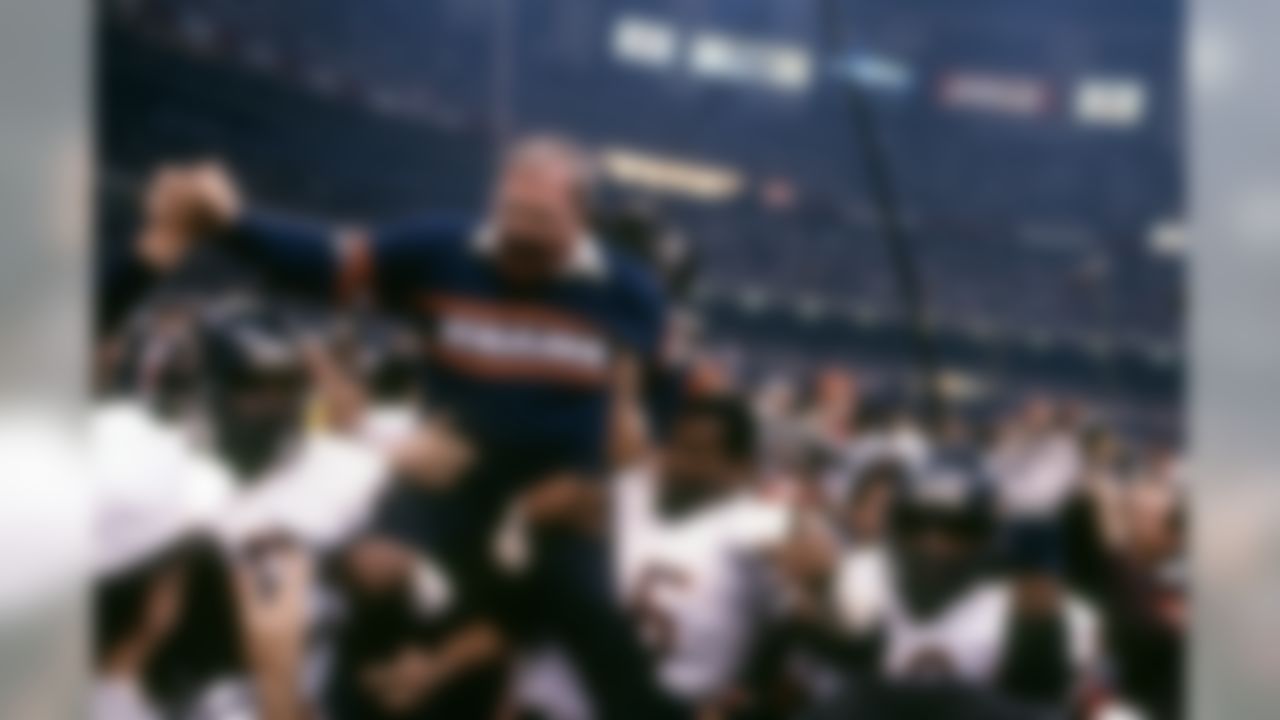 Chicago Bears defensive coordinator Buddy Ryan is carried from the field by his players after his team defeated the the New England Patriots 46�10 during Super Bowl XX Jan. 26, 1986, at the Louisiana Superdome in New Orleans. (Tony Tomsic via AP)