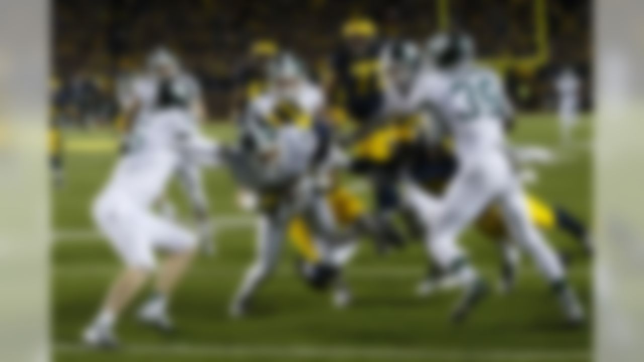 Oct 17, 2015; Ann Arbor, MI, USA; Michigan State Spartans defensive back Jalen Watts-Jackson (20) dives into the end zone for a game winning touchdown as the clock runs out in the fourth quarter against the Michigan Wolverines at Michigan Stadium. Michigan State 27-23. (Rick Osentoski-USA TODAY Sports)