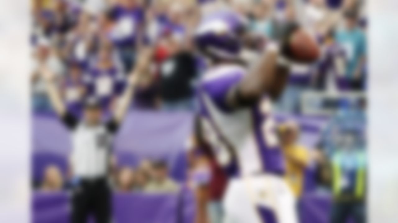 Minnesota Vikings running back Adrian Peterson reacts after scoring a touchdown during the first half of an NFL football game against the Jacksonville Jaguars, Sunday, Sept. 9, 2012, in Minneapolis. (AP Photo/Genevieve Ross)