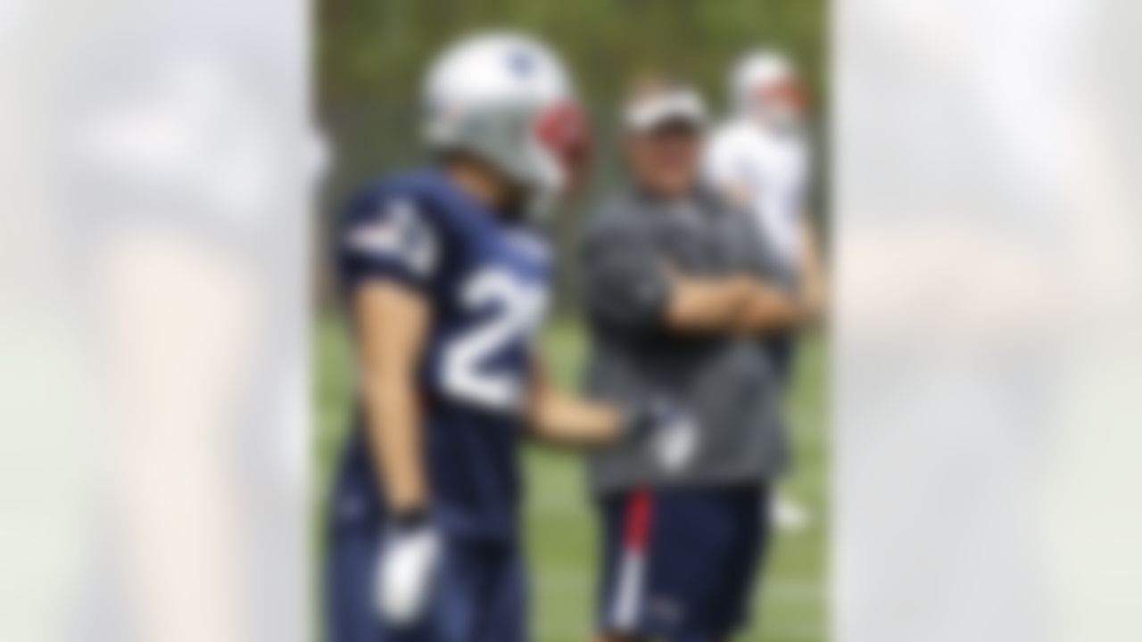 New England Patriots head coach Bill Belichick watches his team practice on the second day of NFL football training camp in Foxborough, Mass., Friday, July 27, 2012. (AP Photo/Stephan Savoia)