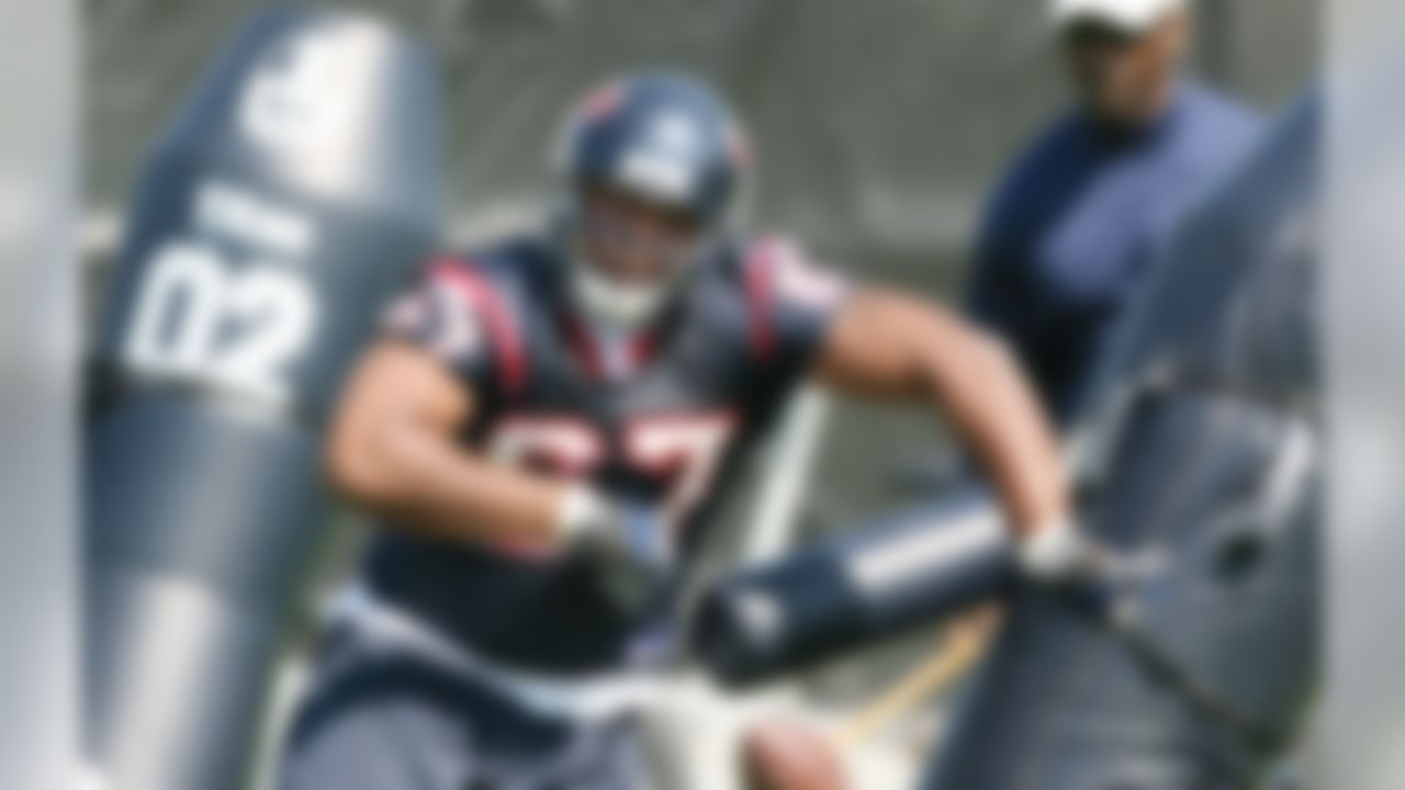 HOUSTON - MAY 09:  Rookie defensive tackle  Gabe Long #67  of the Houston Texans runs drills during a morning practice session May 9, 2008 in Houston, Texas.  (Photo by Bob Levey/Getty Images)