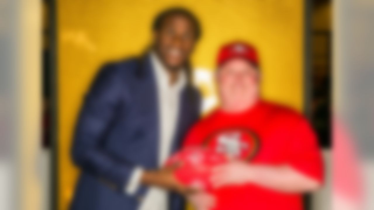 Kansas City Chiefs running back Jamaal Charles (left) and Special Olympics athlete Ryan Epidendio pose for a portrait on Radio Row at the Moscone Center on Friday, Feb. 5, 2016 in San Francisco. (Todd Rosenberg/NFL)