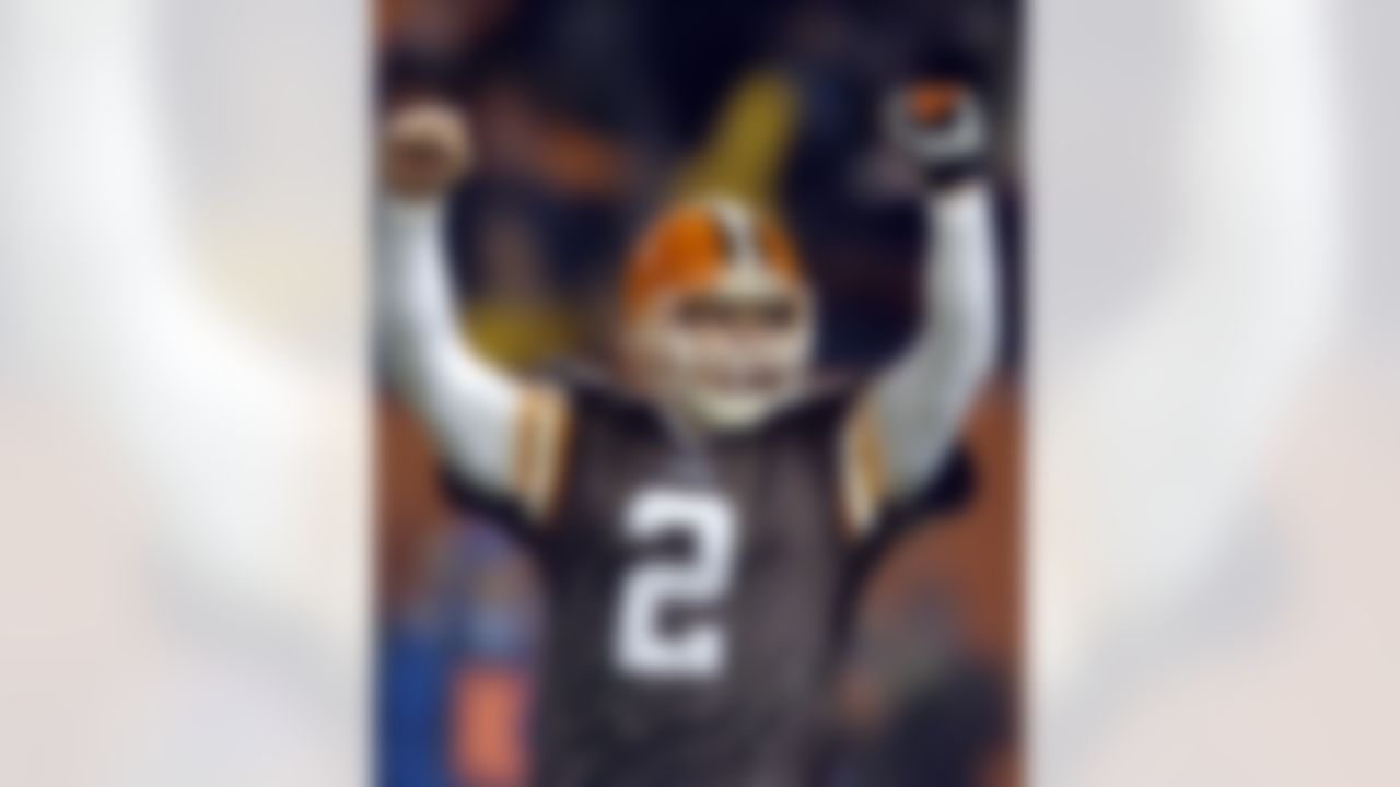 Cleveland Browns quarterback Tim Couch celebrates after a two yard touchdown run by Jamel White in the fourth quarter against the St. Louis Rams Monday, Dec. 8, 2003, in Cleveland. (AP Photo/Mark Duncan)
