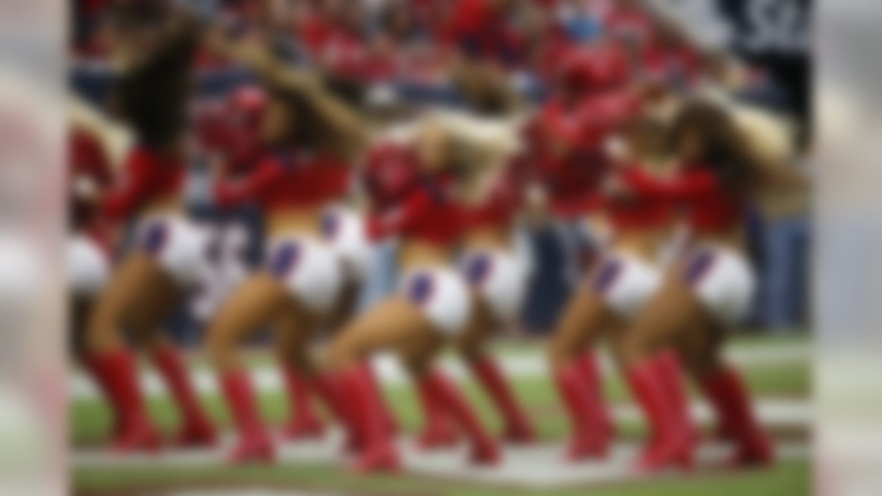 The Houston Texans cheerleaders perform during the second quarter of an NFL football game, Sunday, Nov. 2, 2014, in Houston. (AP Photo/Tony Gutierrez)