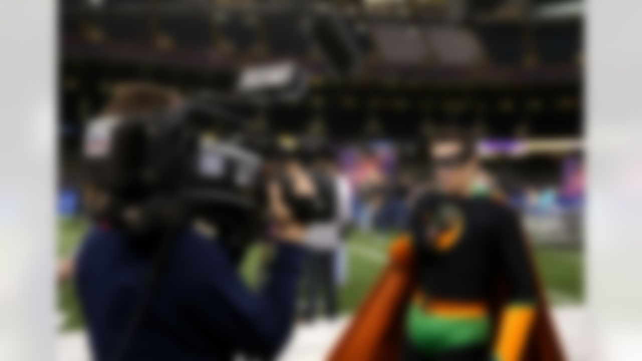 A member of the media dressed in costume before the start of Super Bowl XLVII Media Day at the Superdome on Tuesday, January 29, 2013 in New Orleans, LA. (Ben Liebenberg/NFL)