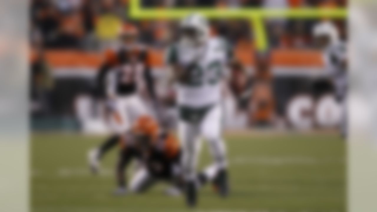 New York Jets running back Shonn Greene (23) breaks free for a 39-yard touchdown run in the first half against the Cincinnati Bengals during the AFC Wild Card Playoff game at Paul Brown Stadium in Cincinnati, Ohio on January 9, 2010. (Photo by Joe Robbins/NFL.com)