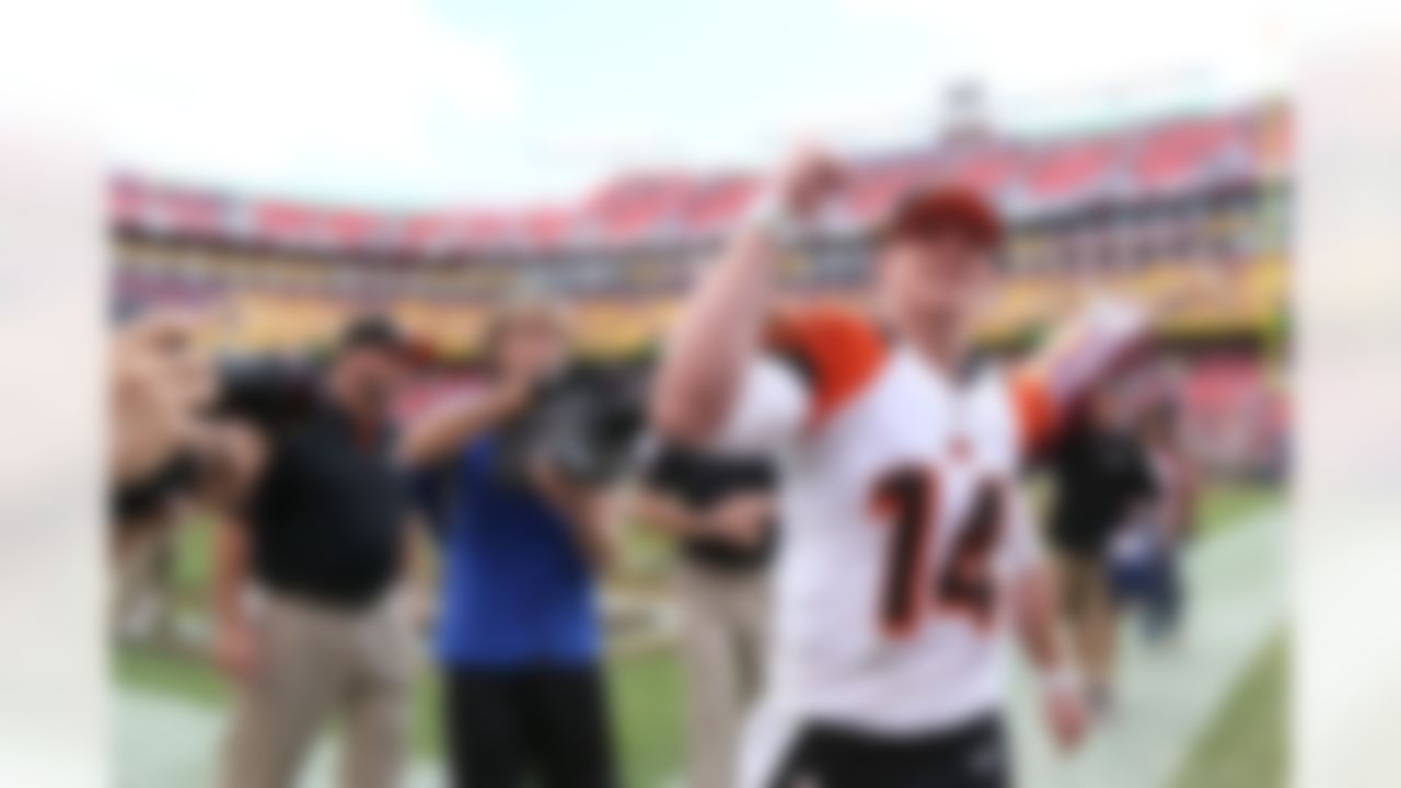 Cincinnati Bengals quarterback Andy Dalton (14) after the game against the Washington Redskins September 23, 2012 at Fedex Field in Landover, Maryland. Cincinnati defeated Washington 38-31. (AP Photo/Damian Strohmeyer)