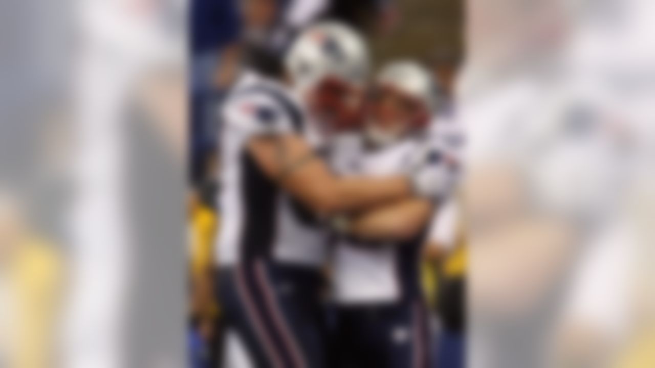 INDIANAPOLIS - NOVEMBER 04: Wes Welker #83 (R) and Nick Kaczur #77 of the New England Patriots celebrate in the endzone after Welker scored on a 3-yard touchdown reception against the Indianapolis Colts on November 4, 2007 at the RCA Dome in Indianapolis, Indiana. The Patriots won 24-20. (Photo by Andy Lyons/Getty Images)