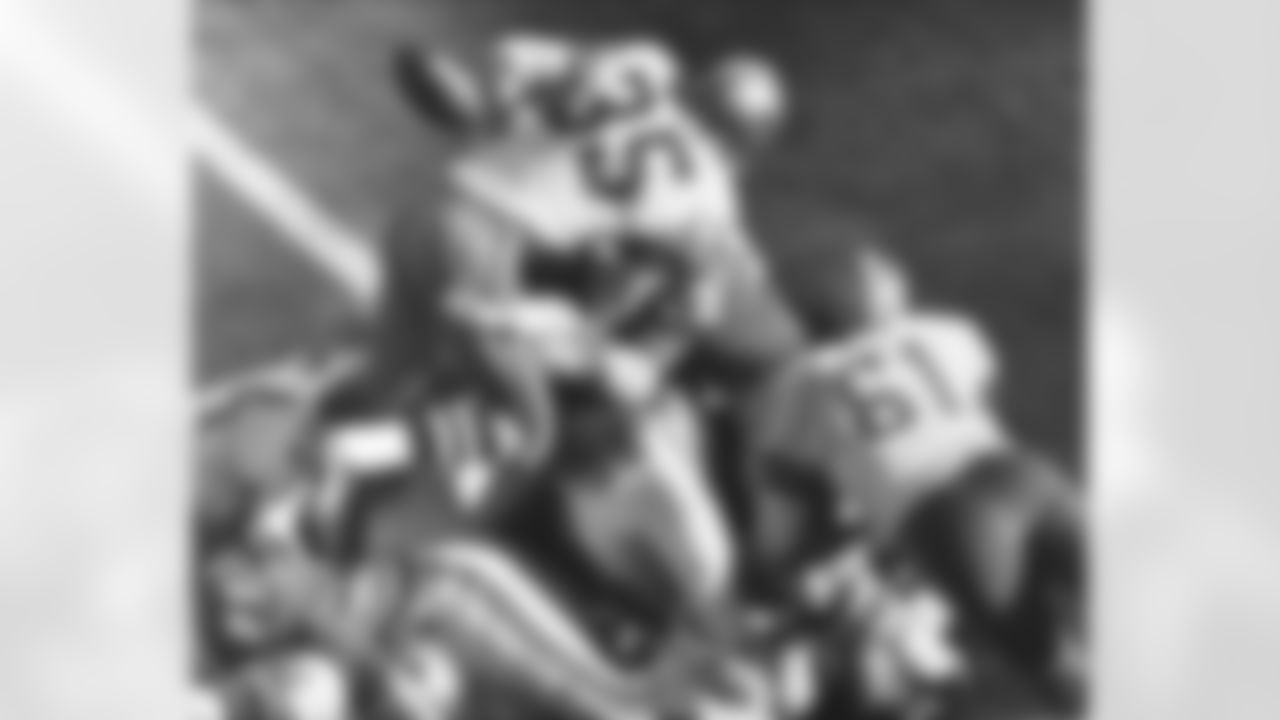 Dallas running back Calvin Hill (35) is thrown back at the goal line as the ball pops loose during fourth quarter of the Super Bowl game in New Orleans, Jan. 16, 1972. It was one of the few mistakes the Cowboys made as they rolled over the Dolphins, 24-3. (Associated Press)