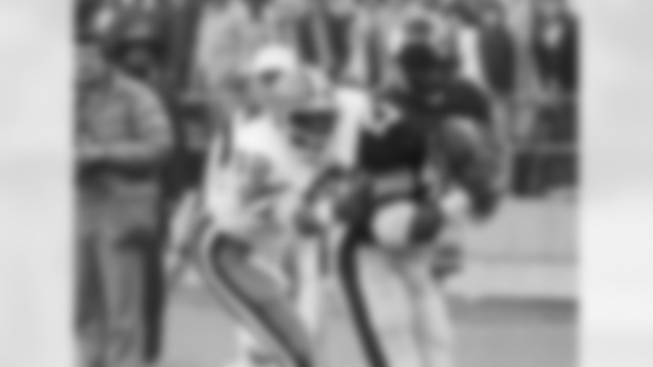 The Pittsburgh Steelers Mel Blount grabs an interception in overtime in front of the Cleveland Browns Ozzie Newsome Nov. 26, 1979 in Pittsburgh. Blount intercepted the Brian Sipe pass on the Steelers four yard line. (AP Photo/Greenawalt)