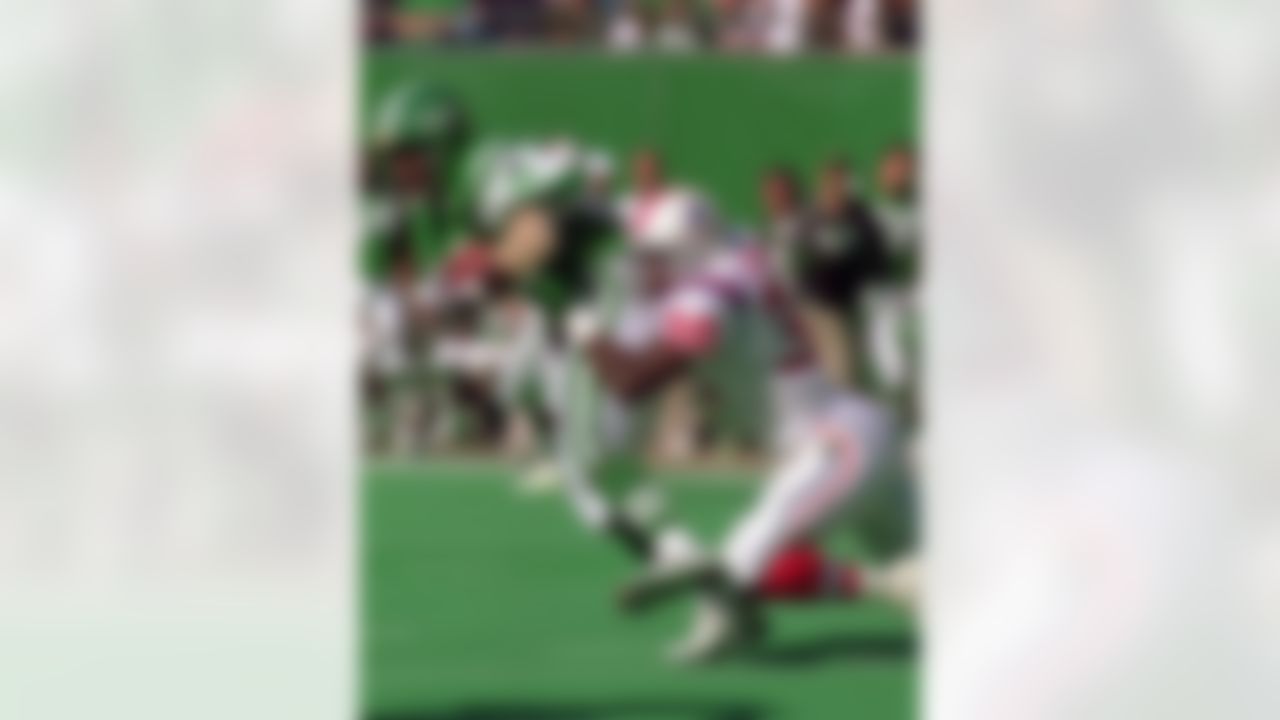 EAST RUTHERFORD, NJ - OCTOBER 17: Wide receiver Art Monk #81 of the New York Jets is brought down by the New England Patriots after a carry on October 17, 1994 at Giants Stadium in East Rutherford, New Jersey. (Photo by Simon Bruty/Getty Images)