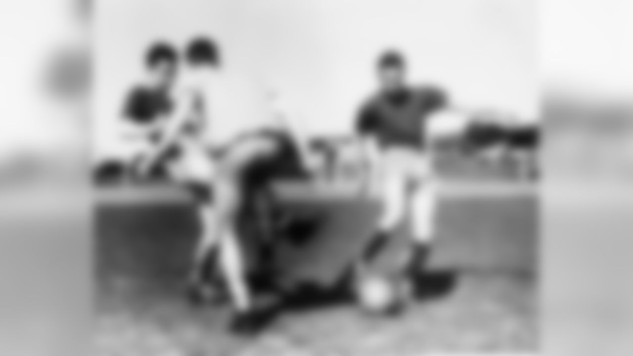 William Clay Ford, right, grandson of Henry Ford, takes the ball after a pass from Lawrence Beecher, left, during a soccer game at the St. Mary's Navy Pre-Flight School, where they are aviation cadets, in Oakland, Calif., April 23,1945. (Associated Press)