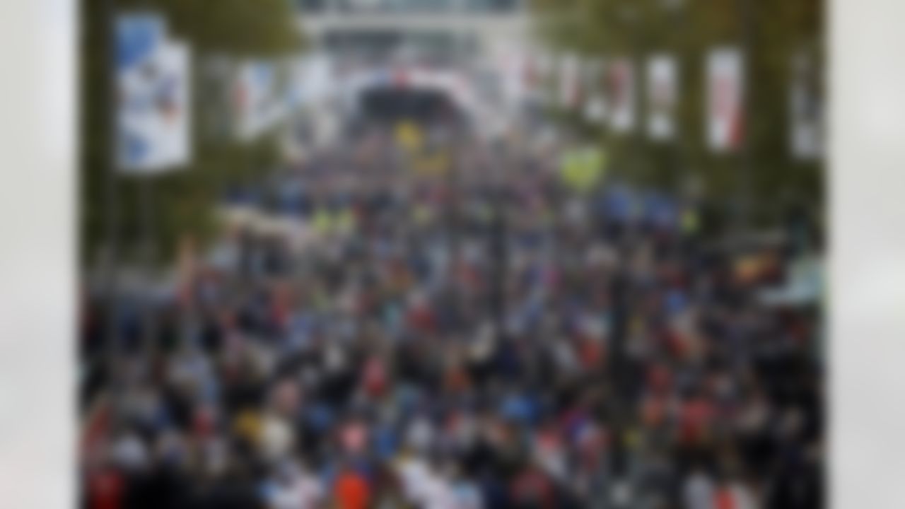 Fans arrive at Wembley Stadium before the NFL football game between the Atlanta Falcons and the Detroit Lions in London, Sunday, Oct. 26, 2014. (AP Photo/Matt Dunham)
