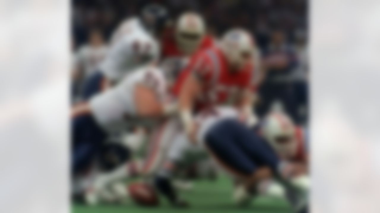Chicago Bears Walter Payton (34) drops the ball as New England Patriots tackle him in the first quarter of Super Bowl XX, in New Orleans, January 26, 1986. (AP Photo/Amy Sancetta)