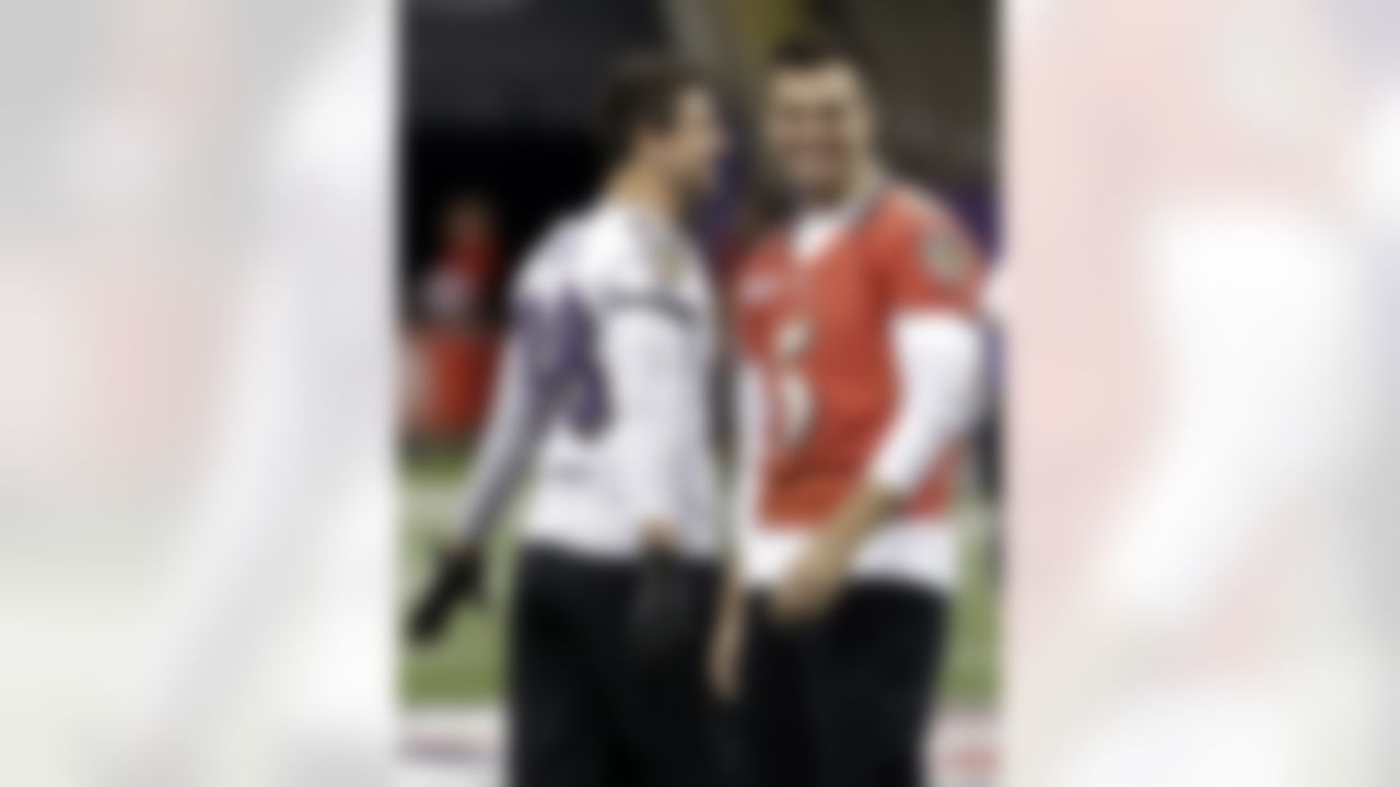 Baltimore Ravens quarterback Joe Flacco, right, and tight end Dennis Pitta share a light moment during an NFL Super Bowl XLVII walkthrough on Saturday, Feb. 2, 2013, in the Mercedes-Benz Superdome in New Orleans. The Ravens face the San Francisco 49ers in Super Bowl XLVII on Sunday. (AP Photo/Patrick Semansky)