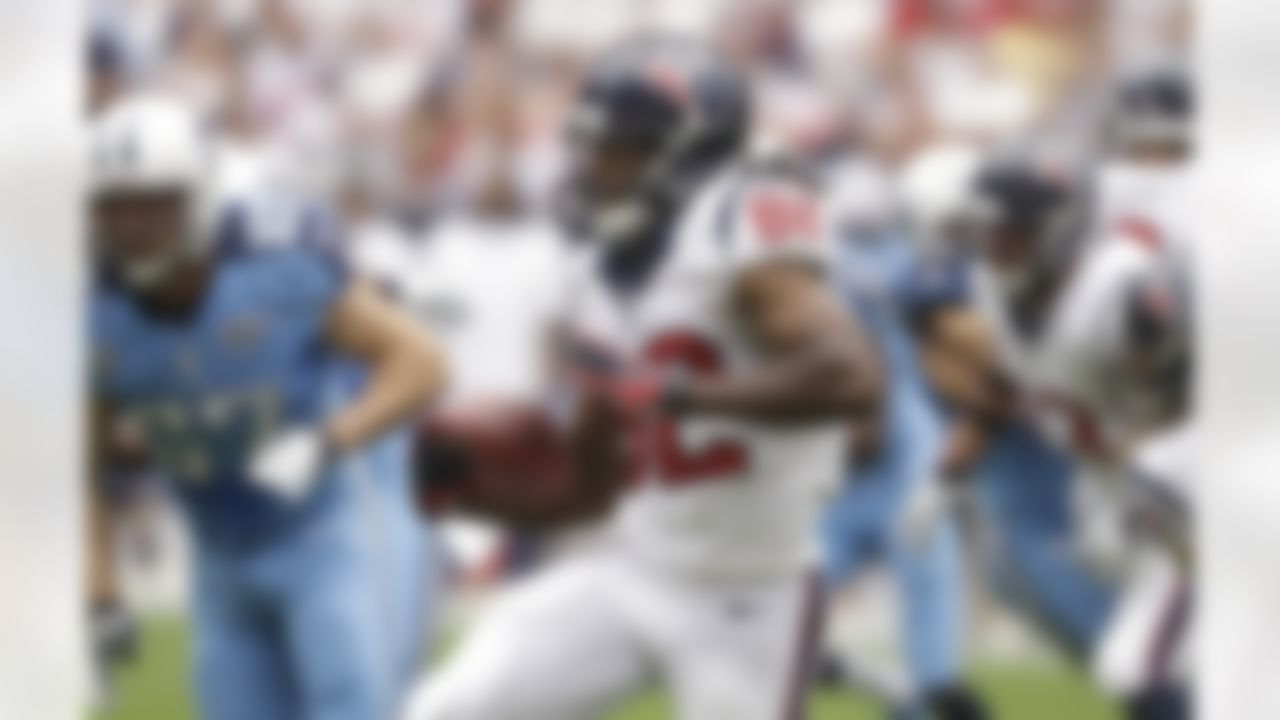 Houston Texans' Keshawn Martin (82) looks for yardage against the Tennessee Titans after a catch during the first quarter of an NFL football game on Sunday, Sept. 15, 2013, in Houston. (AP Photo/Patric Schneider)