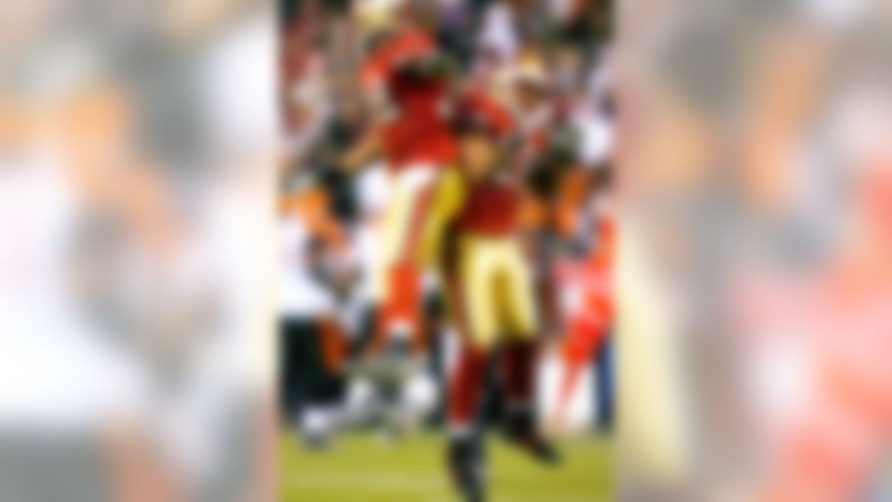 SAN FRANCISCO - DECEMBER 15: Nate Clements #22 and Michael Lewis #32 of the San Francisco 49ers celebrate near the end of the game against the Cincinnati Bengals on December 15, 2007 at Monster Park in San Francisco, California. (Photo by Joe Robbins/Getty Images)