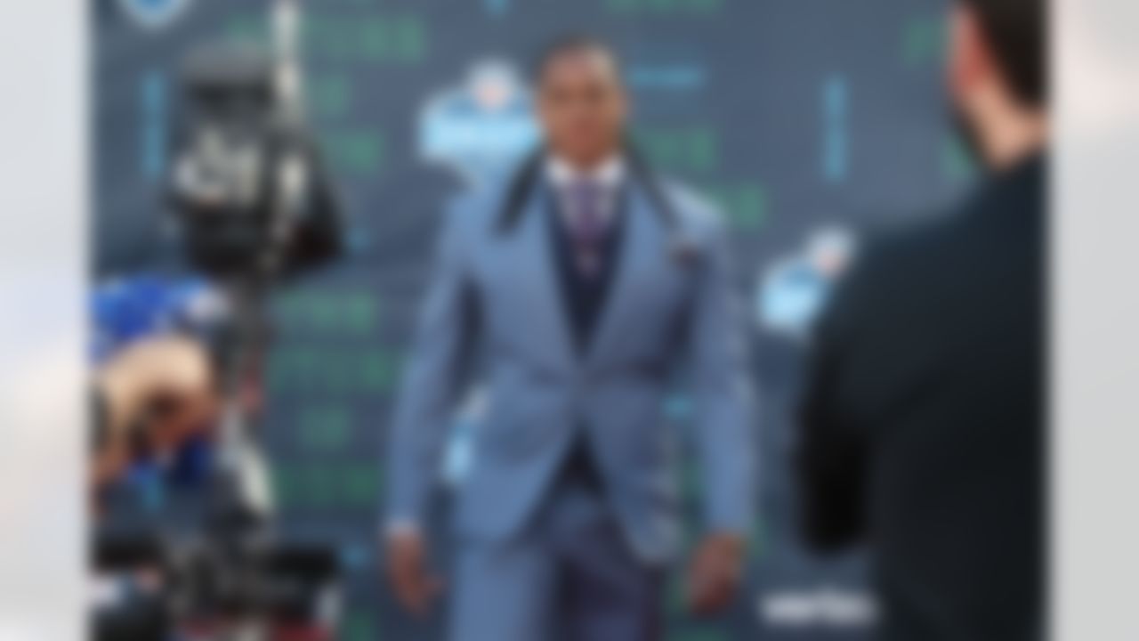 Virginia Tech's Tremaine Edmunds walks down the red carpet.
