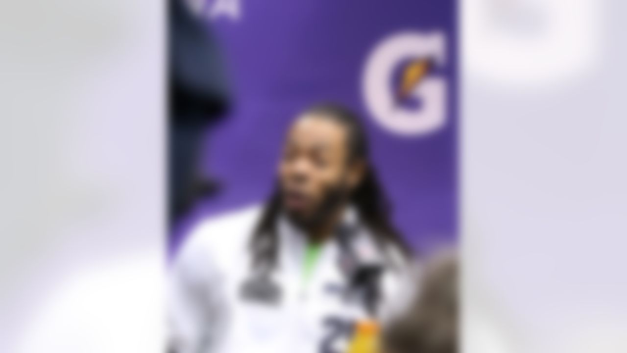 Seattle Seahawks cornerback Richard Sherman answers questions from reporters during Media Day for Super Bowl XLIX at the U.S. Airways Center on Tuesday, January 27, 2015 in Phoenix, AZ. (Ben Liebenberg/NFL)