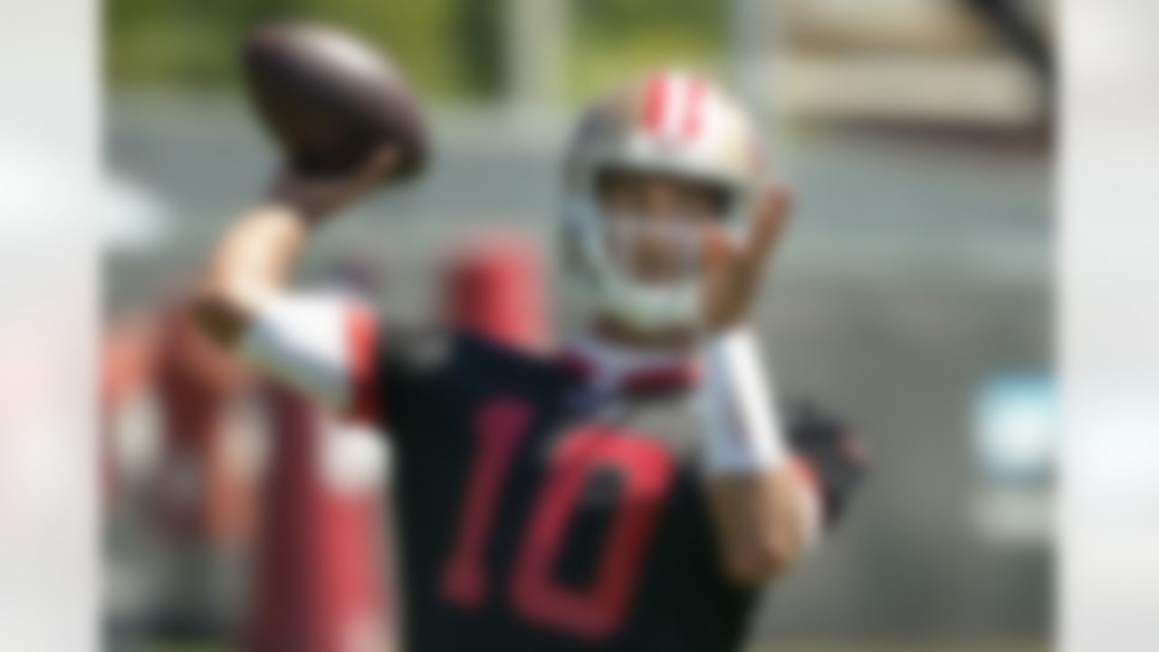 San Francisco 49ers quarterback Jimmy Garoppolo throws a pass during a drill at the team's NFL football training facility in Santa Clara, Calif., Tuesday, June 10, 2019.