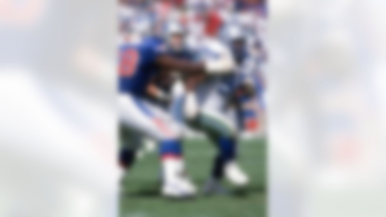Seattle Seahawks defensive tackle Cortez Kennedy (96) is seen in action during an NFL game against the New England Patriots Sept. 19, 1993, in Foxborough, Mass. (Allen Kee via AP)