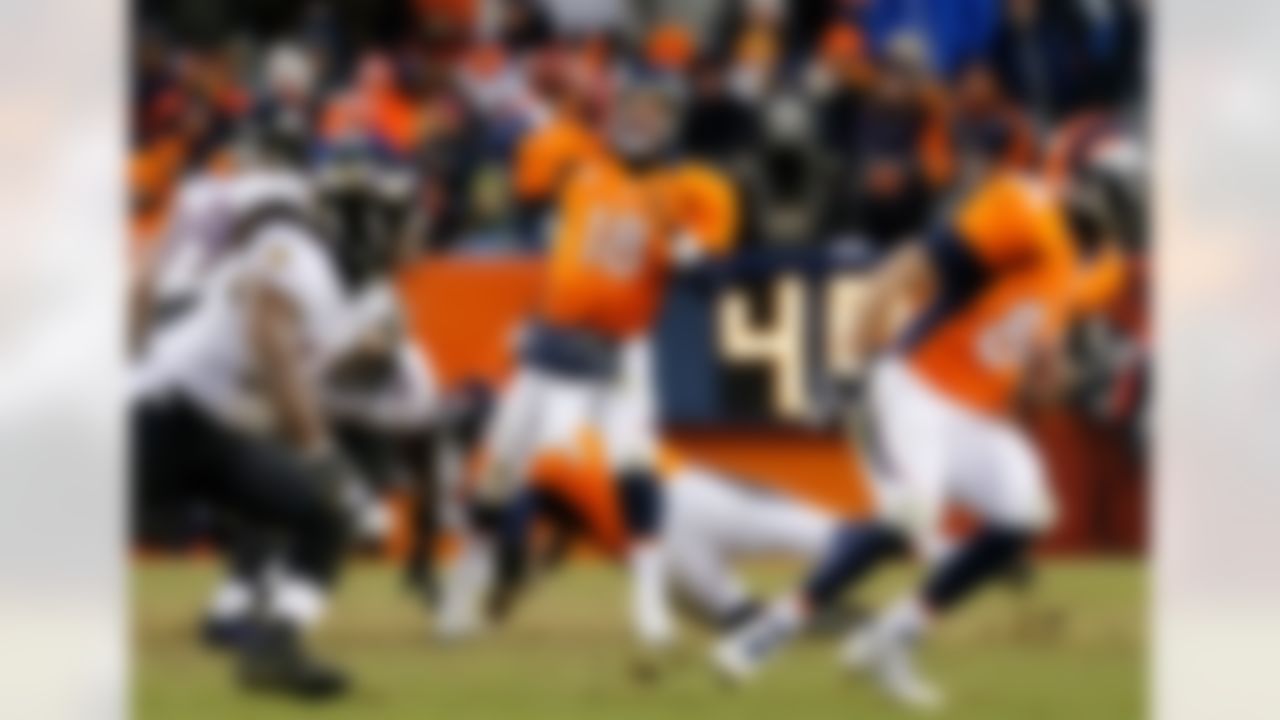 Denver Broncos quarterback Peyton Manning (18) throws a pass during the AFC Divisional playoff against the Baltimore Ravens at Mile High in Denver, Colorado on January 12, 2013. (Ric Tapia/NFL)