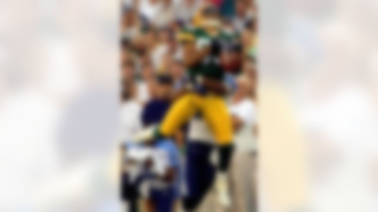Green Bay Packers receiver Terry Glenn catches a pass in front of Tennessee Titans' Andre Dyson in the first quarter Friday, Aug. 30, 3003, in Green Bay, Wis. (Morry Gash/Associated Press)