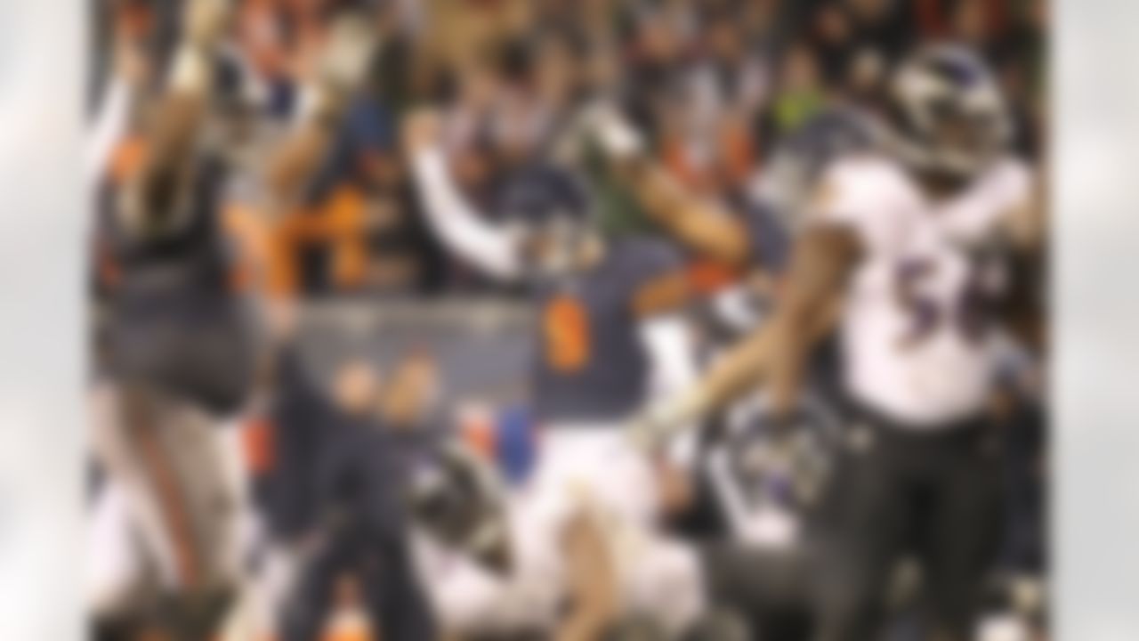 Robbie Gould celebrates his game-winning field goal attempt as the Chicago Bears defeated the Baltimore Ravens in overtime. (Todd Rosenberg/NFL)