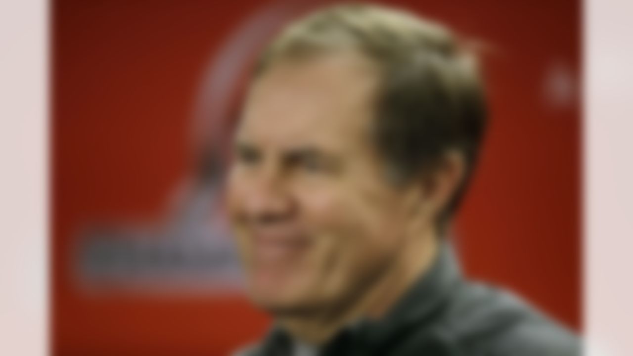 New England Patriots coach Bill Belichick smiles as he answers a question during a media availability at the NFL football team's facility in Foxborough, Mass., Wednesday, Jan. 15, 2014. The Patriots will play the Denver Broncos in the AFC Championship Game Sunday in Denver. (AP Photo/Stephan Savoia)