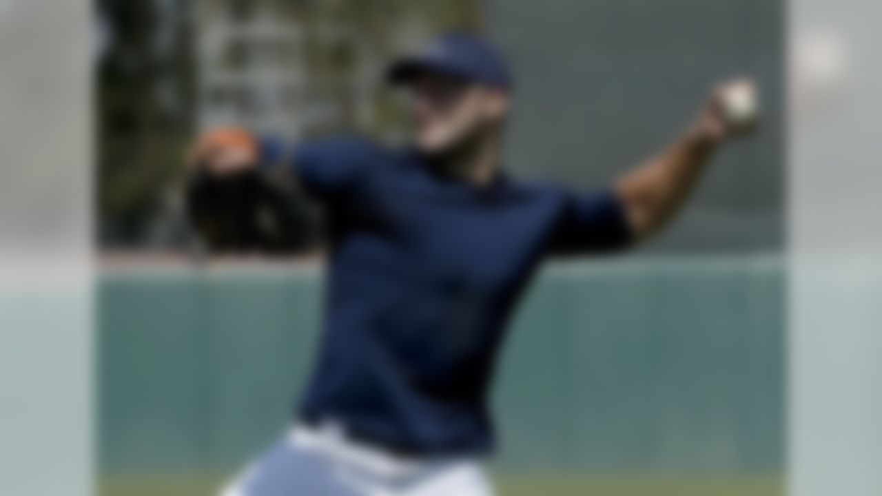 Former NFL quarterback, Tim Tebow throws a ball for baseball scouts and the media during a showcase on the campus of the University of Southern California, Tuesday, Aug. 30, 2016 in Los Angeles. The Heisman Trophy winner works out for a big gathering of scouts on USC's campus in an attempt to start a career in a sport he hasn't played regularly since high school. (AP Photo/Chris Carlson)