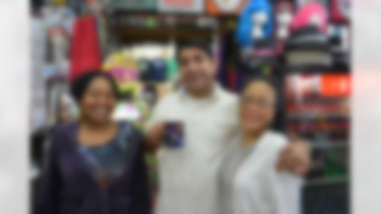 Merchants pose for a photo outside of their store on Monday, January 28, 2013 in New Orleans, LA. (Celeste Pascual/NFL)