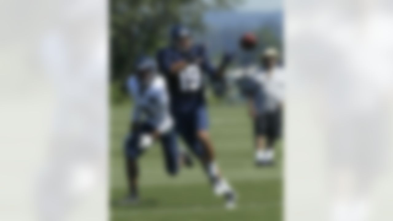 Seattle Seahawks' Lavassier Tuinei (19) makes a catch as DeShawn Shead, left, looks on, Friday, Aug. 3, 2012, during NFL football training camp drills, in Renton, Wash. (AP Photo/Ted S. Warren)