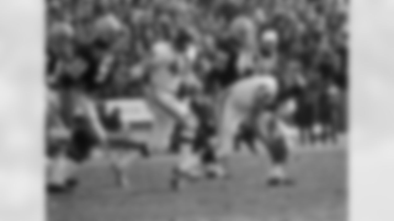 Chicago Bears Garry Lyle (44) scoops up ball after Ron Smith (48) blocked a Packer field goal attempt in game against Packers at Green Bay on Dec. 13, 1971. Packers? Tim Webster made the low kick attempt and Donny Anderson (44) was the holder. Packers won, 31-10. (AP Photo)