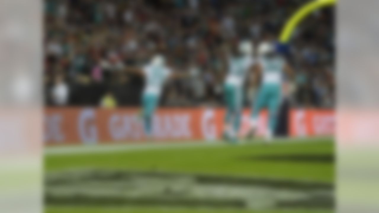 Brent Grimes of Miami celebrates his interception against the Oakland Raiders at Wembley Stadium in London.
(Sean Ryan/NFL)
