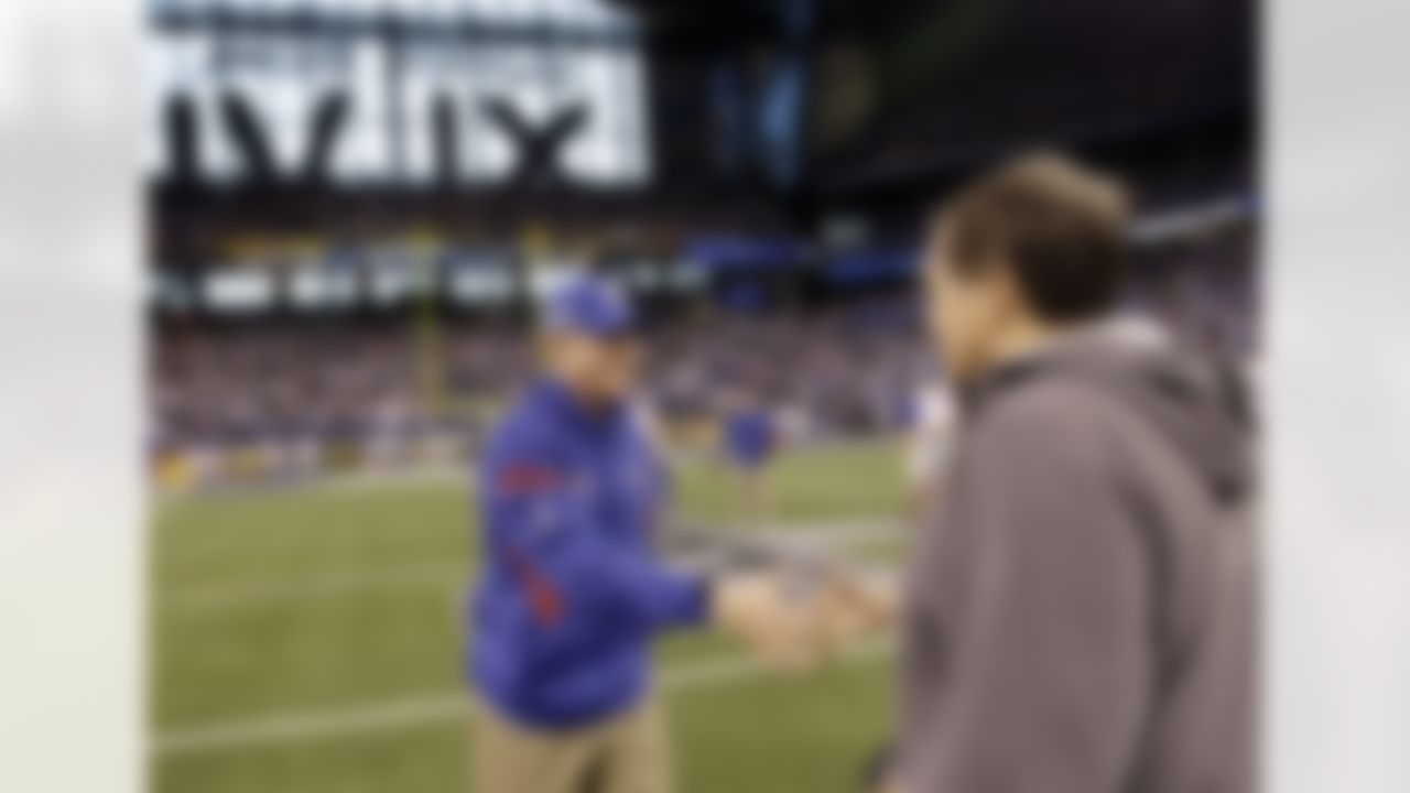 New York Giants head coach Tom Coughlin, left, greets New England Patriots head coach Bill Belichick, right, before the NFL Super Bowl XLVI football game in Indianapolis. AP Photo/David J. Phillip)
