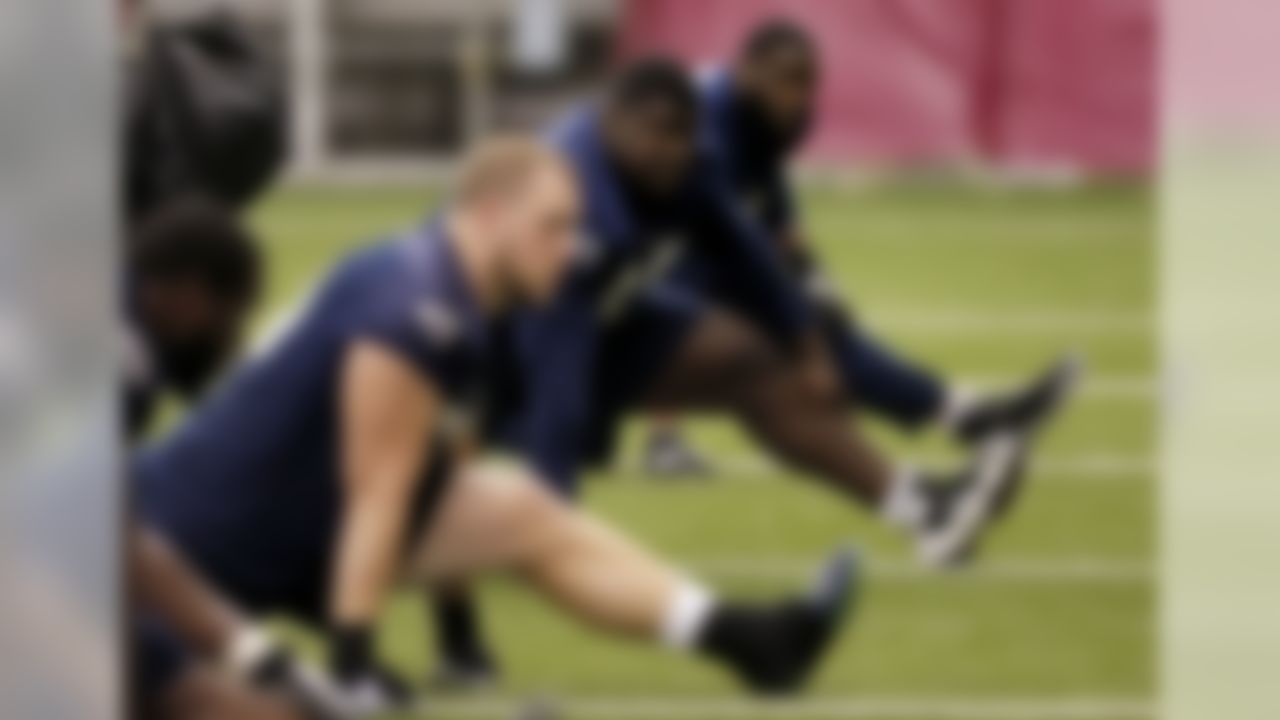 Seattle Seahawks players stretch during a team practice for NFL Super Bowl XLIX football game, Friday, Jan. 30, 2015, in Tempe, Ariz. The Seahawks play the New England Patriots in Super Bowl XLIX on Sunday, Feb. 1, 2015. (AP Photo/Matt York)