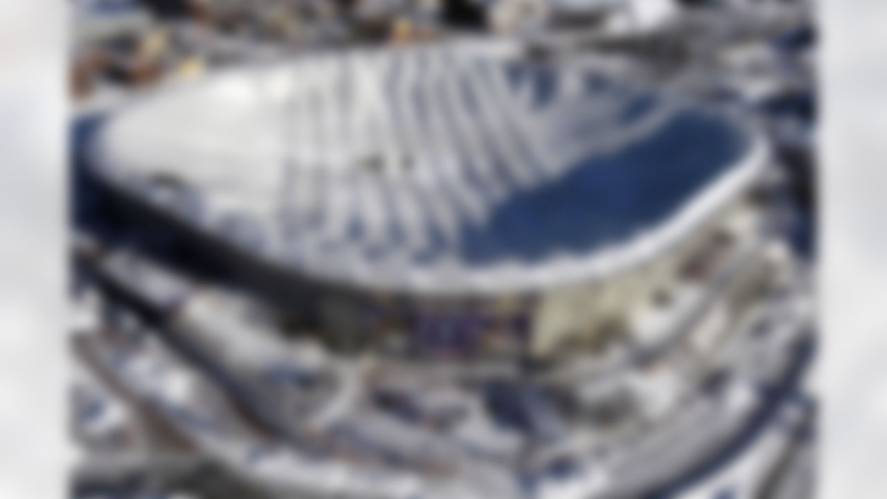 The collapsed roof of the Metrodome is shown in this aerial view in Minneapolis on Sunday, Dec. 12, 2010. The inflatable roof of the Metrodome collapsed Sunday after a snowstorm that dumped 17 inches on Minneapolis. No one was hurt, but the roof failure sent the NFL scrambling to find a new venue for the Vikings' game against the New York Giants. (AP Photo/Ann Heisenfelt)