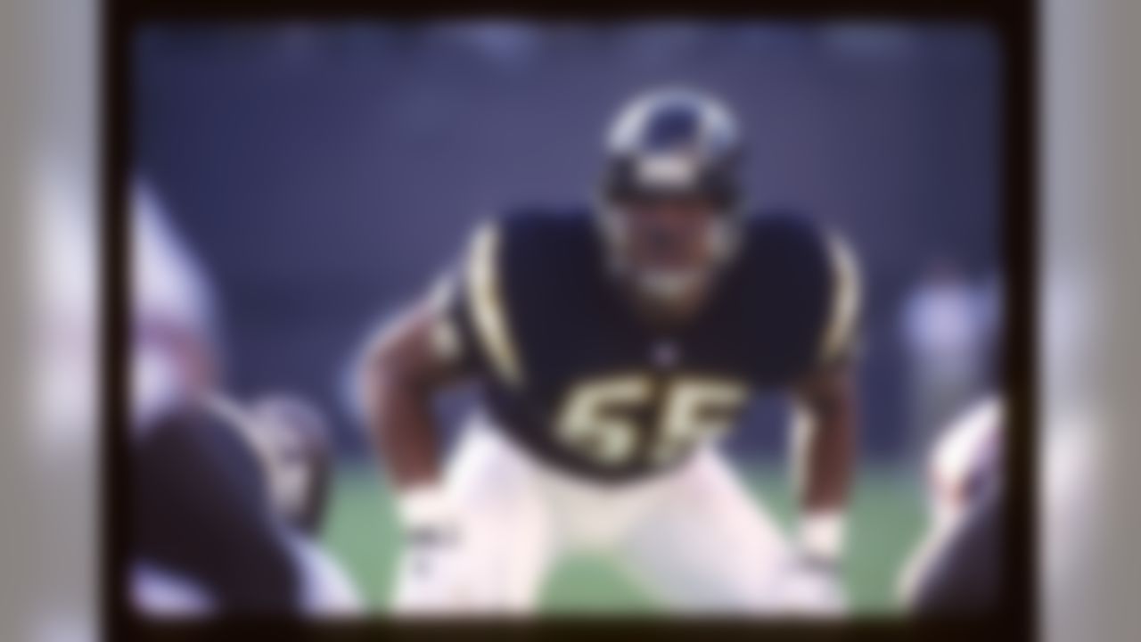 San Diego Chargers linebacker Junior Seau (55) sets into position during a NFL football game against the Phoenix Cardinals on August 21, 1993 in San Diego. The Chargers won the game 10-3.(AP Photo/Paul Jasienski)